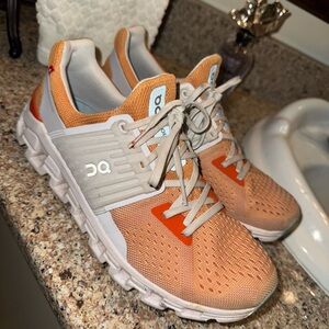 On Running Cloudswift Shoes for Women - Orange and White Sneakers